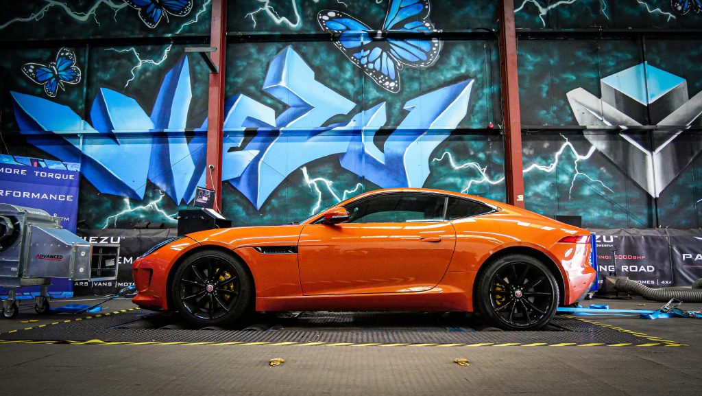 Orange Jaguar F-Type on a dyno