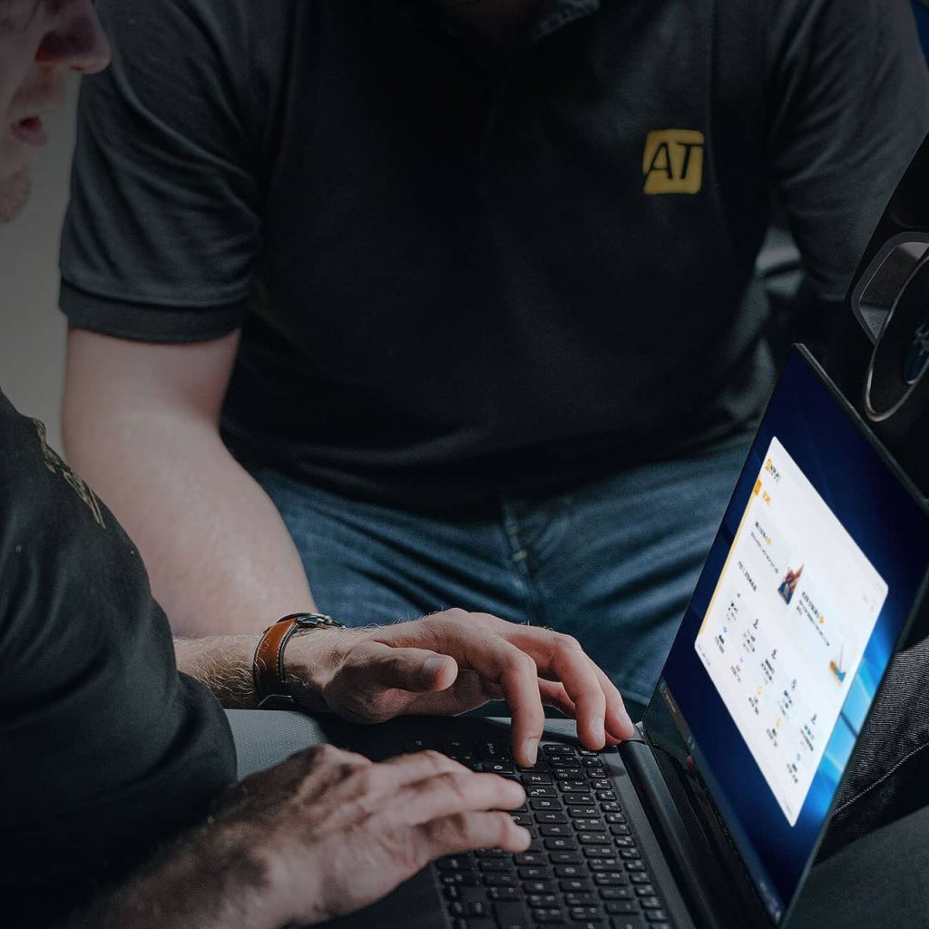 man on laptop using autotuner